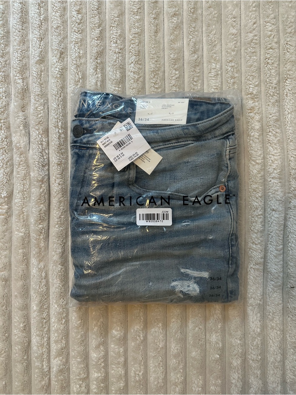 American Eagle Outfitters Men’s Light Blue Athletic Fit AirFlex+ Distressed Jean